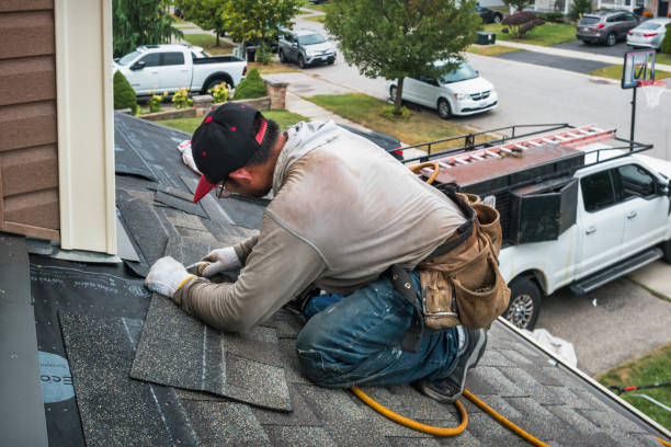 Professional Hail Damage Roof Repair technician working in Monmouth Junction, NJ